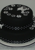 Modest black and white wedding cake