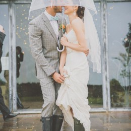 Wedding couple in the rain