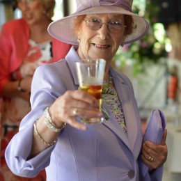 Old lady holding a drink