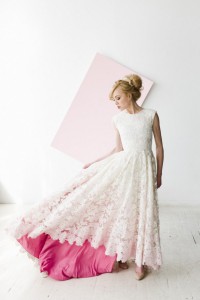 Pink petticoat in white lace dress