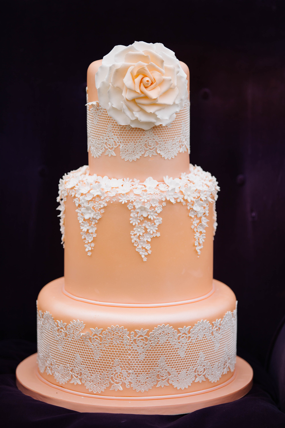 Wedding lace cake in coral