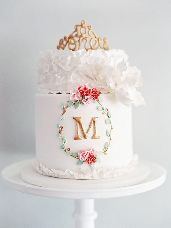wedding cake with a crown and a monogram